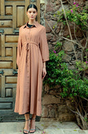 Beige button-down drawstring maxi dress on woman